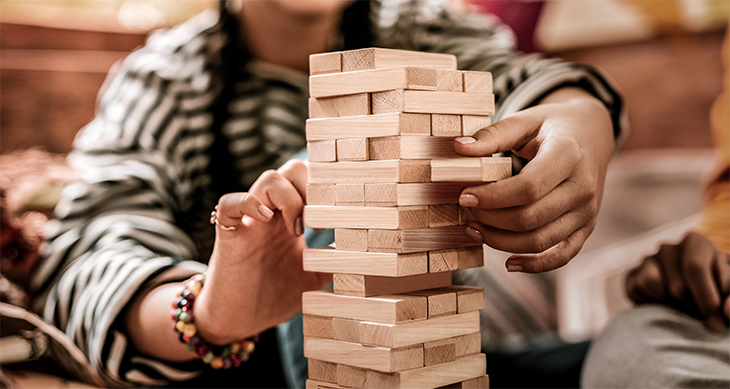 Playing Jenga in a Gaming Room